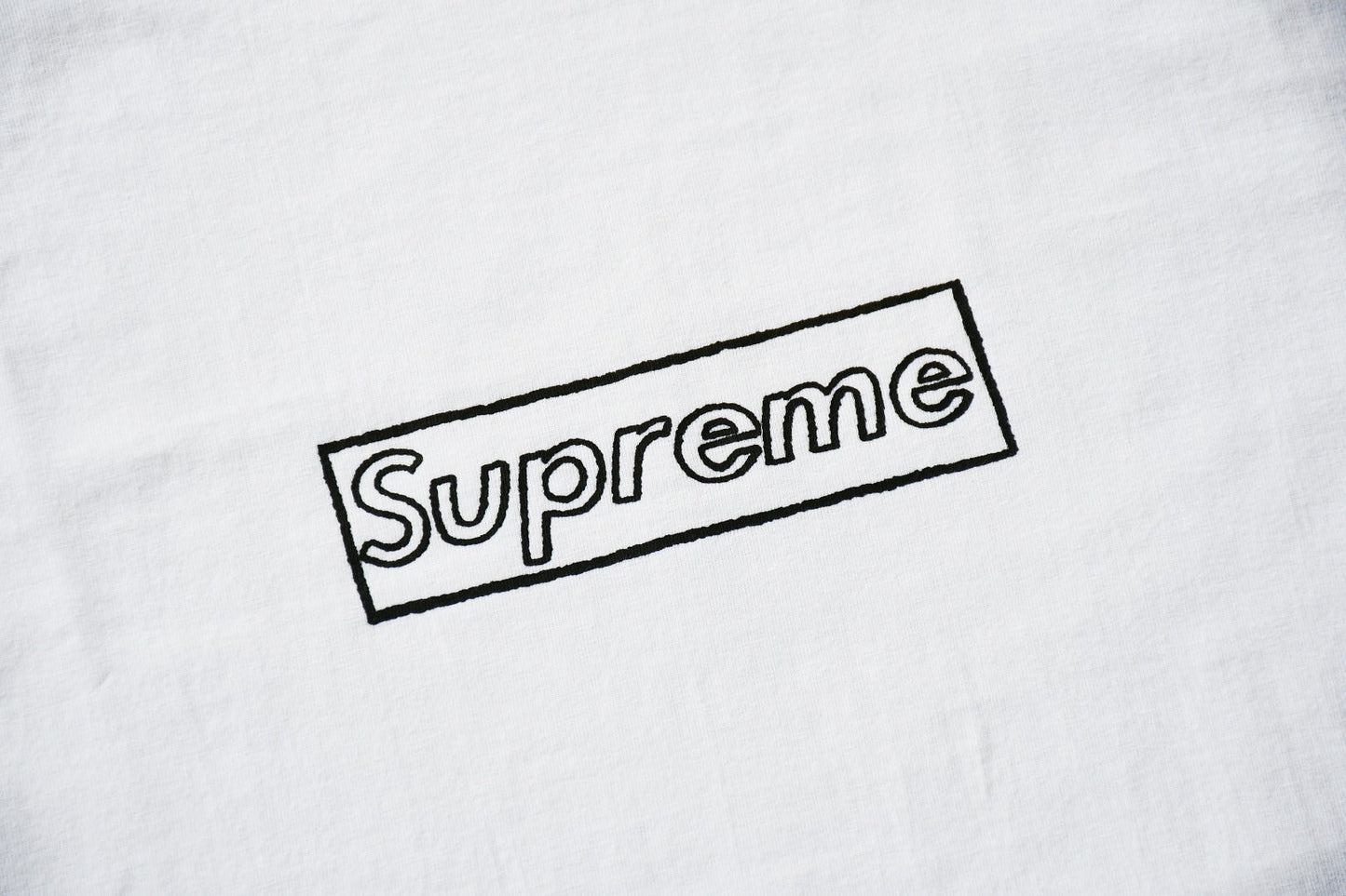 Camiseta Supreme WEEK 18 X KAWS