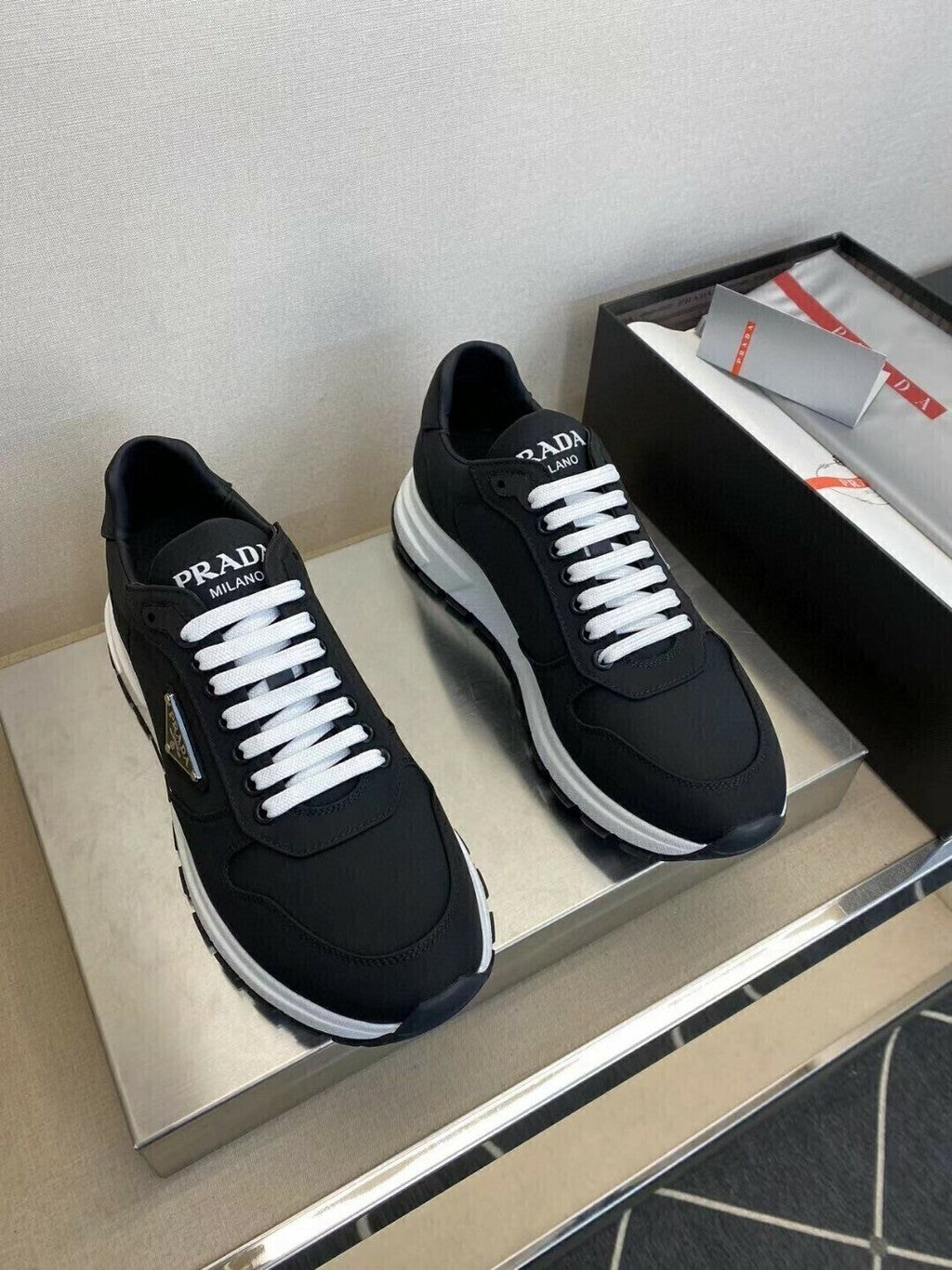 Prada PRAX 01 Sneakers Re-Nylon Brushed Leather Black White